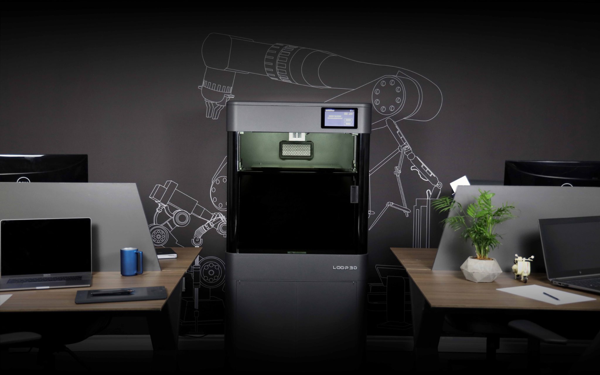 Office environment, desks and Loop Pro X 3D Printer.